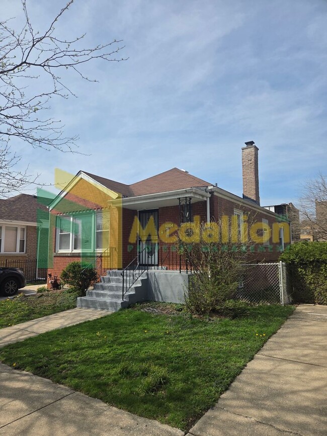 Building Photo - Spacious 4-Bedroom Home with Finished Basement and Yard Space