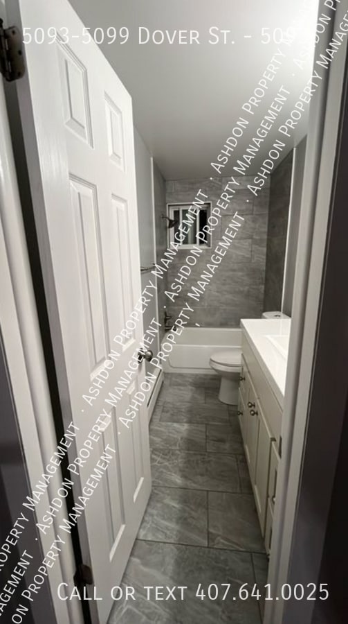 Building Photo - 5093-5099 Dover St.-5093