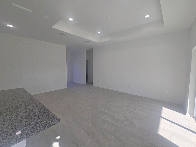 Building Photo - Brand New 4/2/2- South Lehigh Acres