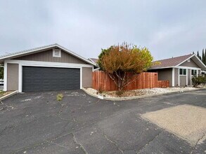Building Photo - "Charming Concord Retreat: 3-Bedroom Gem with Granite Accents & Cozy Fireplace"
