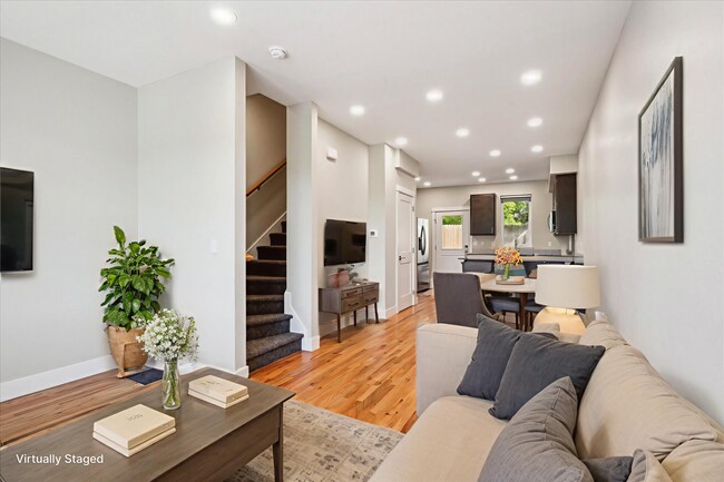 Building Photo - Modern 4-Bedroom Townhome with Rooftop Deck Near Sloan’s Lake & Light Rail