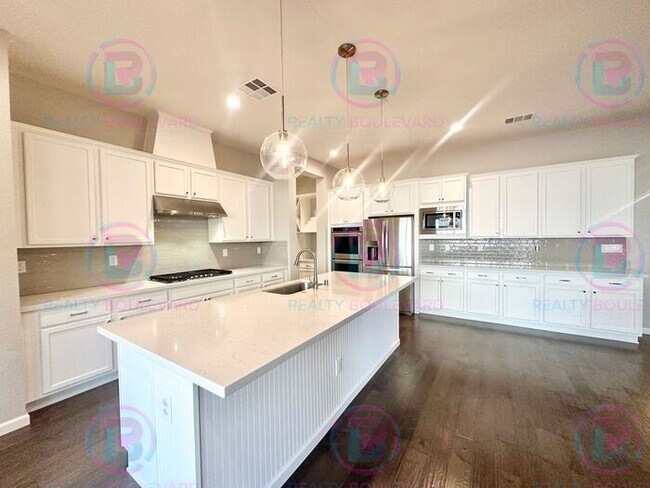 Building Photo - 5 Bedroom 3 Car Garage Home with Spa-Like Primary Suite & Resort-Style Backyard with Office, Loft...