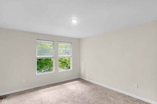 Building Photo - "Charming 3-Bed Duplex with Modern Comforts at 2235 MLK Jr Street, Indianapolis!"