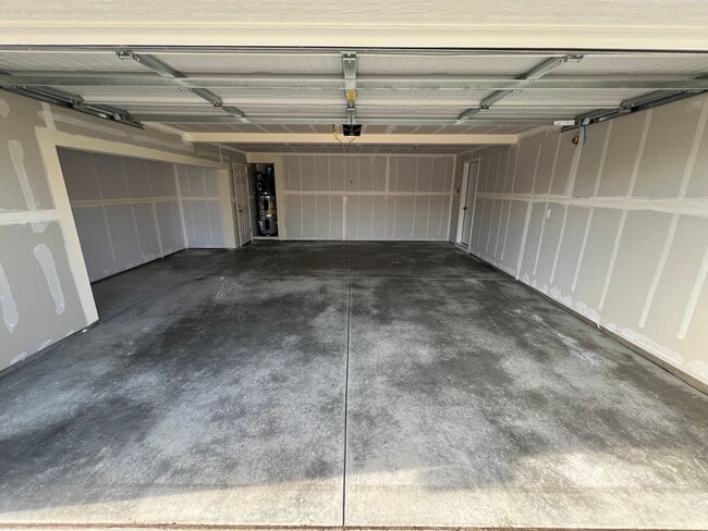 Building Photo - NEW Modern Townhouse with Two Car Garage i...