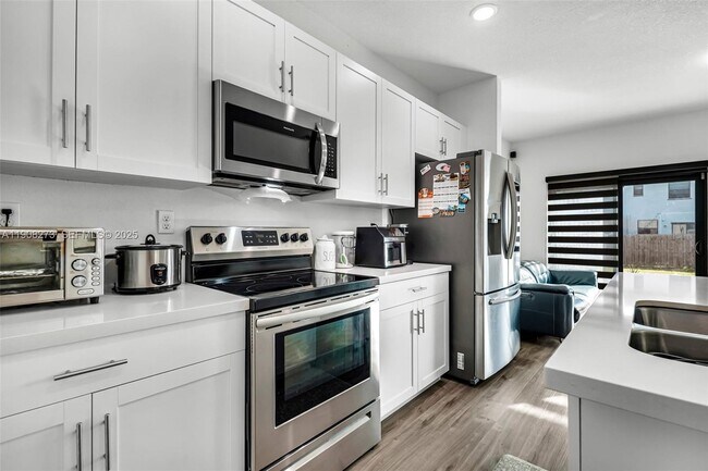 Building Photo - 24985 SW 107th Ct