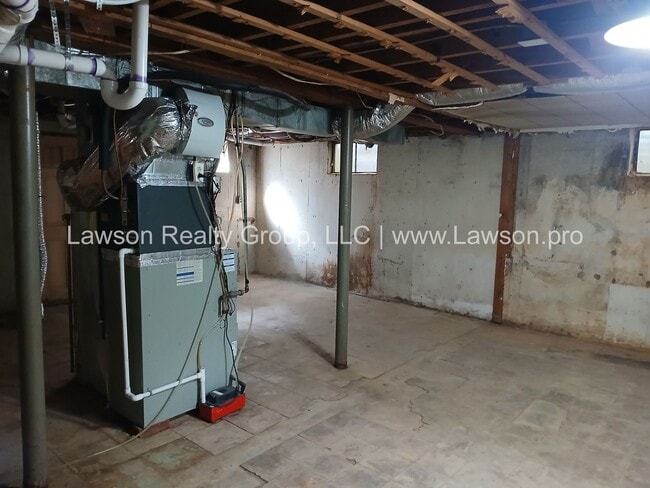 Building Photo - Charming Brick Ranch with Beautifully Land...