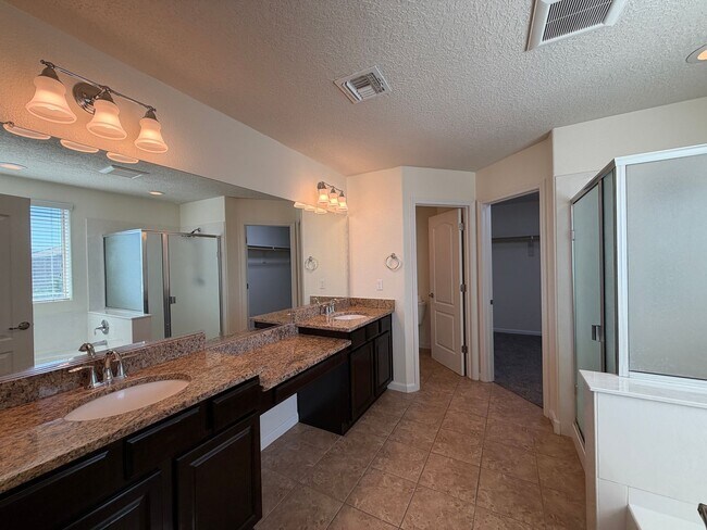 Building Photo - 4 Bedroom + Office Home Available Near Loma Colorado Blvd NE & Broadmoor Blvd NE in Rio Rancho!