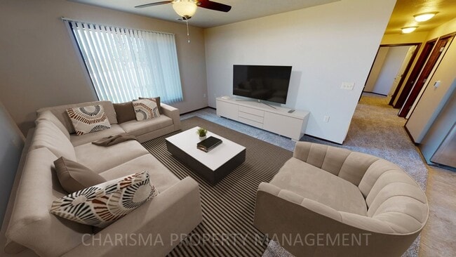 Building Photo - LOWER LEVEL 3 BEDROOM, 2 BATH TOWN HOME, INDIVIDUAL ENTRANCE, DOUBLE ATTACHED GARAGE, PET FRIENDLY