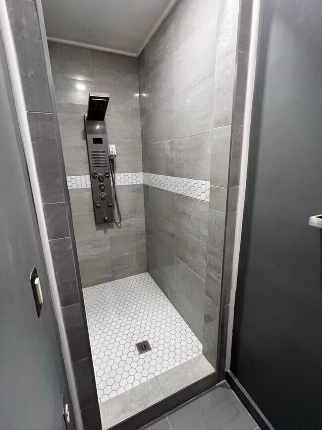 Building Photo - Spacious 2-Bedroom Townhome with Finished Studio Suite – Prime Location!