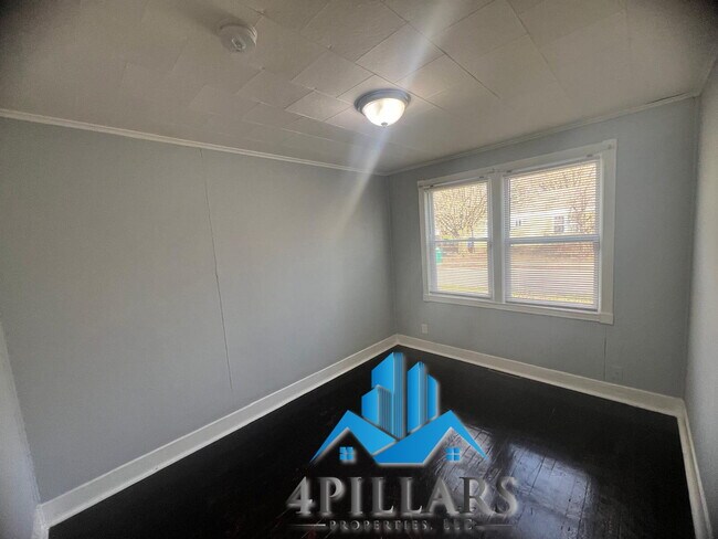 Building Photo - Charming 2 Bedroom Duplex in La Porte with Spacious Layout and Prime Location