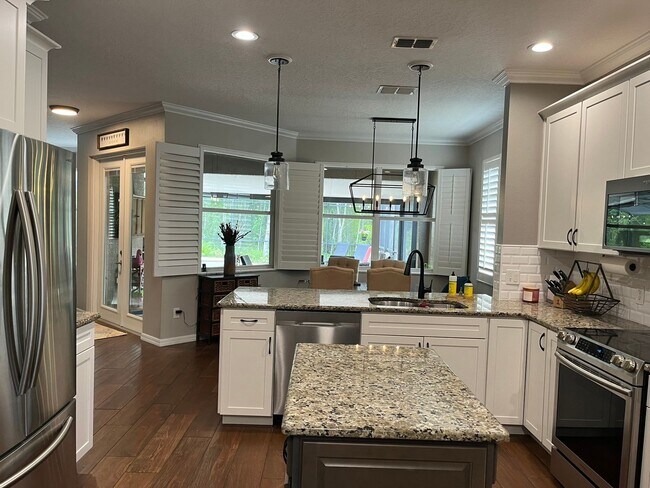 Building Photo - 5 Bedroom 3 Bath Lake Nona Santuary Availa...
