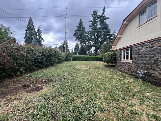 Building Photo - Charming Cottage Home with Timeless Character, Hardwood Floors, Flexible Living Spaces, and Expan...