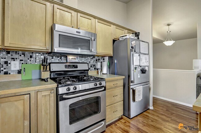 Building Photo - East Anchorage Home with Utilities Included!! Close to JBER! Attached Two Car Garage + Fenced in ...