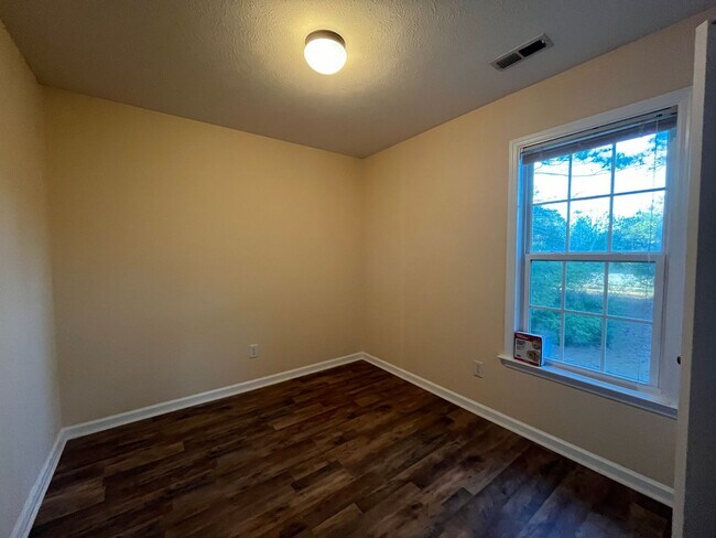 Building Photo - HALF OFF FIRST FULL MONTHS RENT!