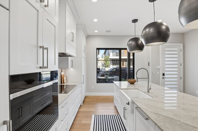 Building Photo - Modern 5-Bed Home in Atlas Waterfront — Elevator, Luxury Finishes & Prime Location