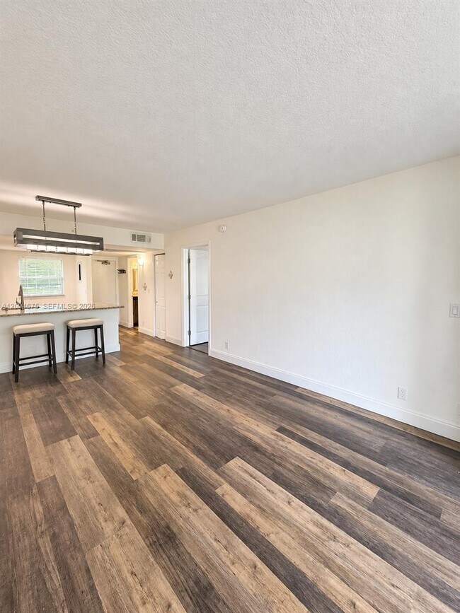 Building Photo - 9440 Poinciana Pl
