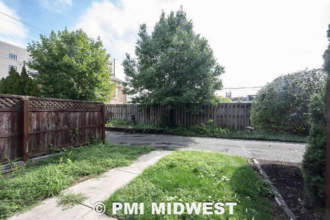 Building Photo - "Charming Urban Duplex Retreat: Cozy 2-Bedroom, 1.5-Bath Oasis in Vibrant Indianapolis!"
