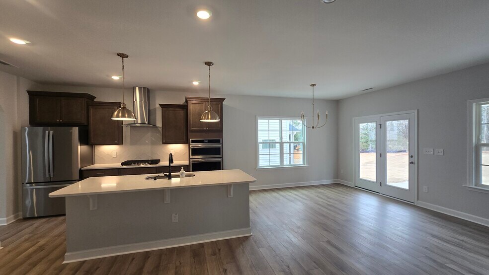 Living area + open concept kitchen - 55 Paper Birch Trl