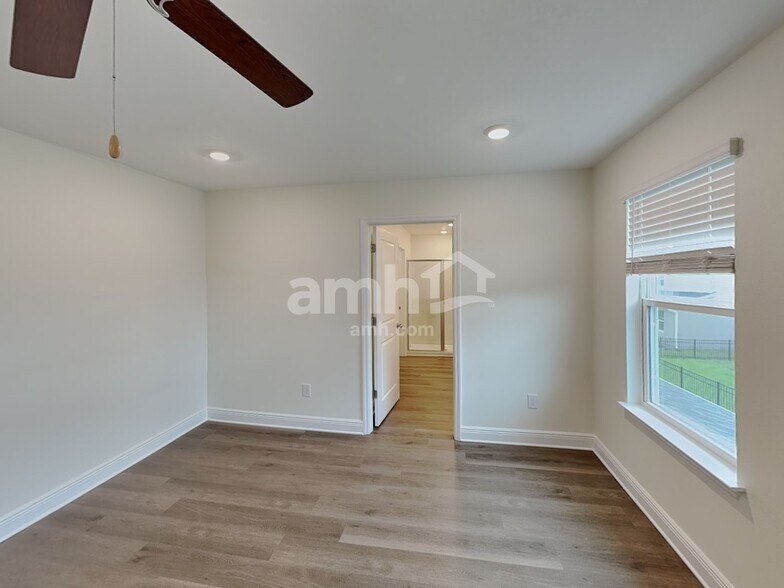Building Photo - 5980 Pinewood Ests Dr