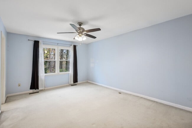 Building Photo - Modern Brick End-Unit Townhome with Stunning Upgrades and Serene Wooded Views