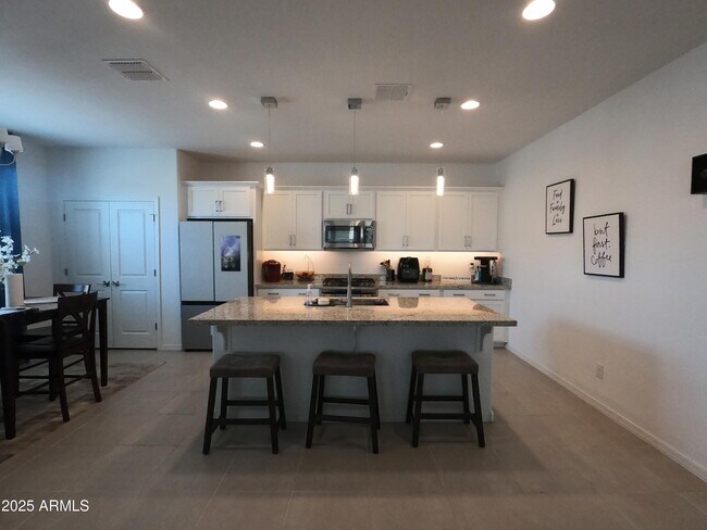Building Photo - 3820 N 100th Dr