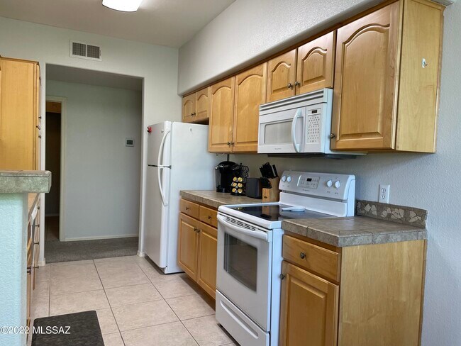 Building Photo - 7050 E Sunrise Dr