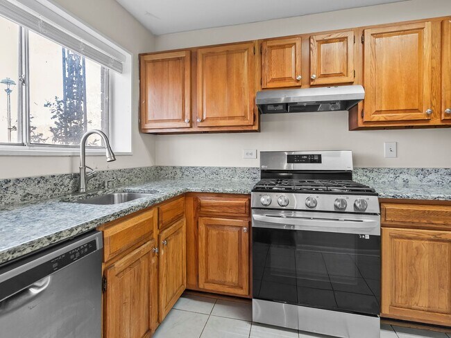 Building Photo - Commuter’s Dream! Large 2BR/2BA Condo Steps from Metro – All Utilities Included!