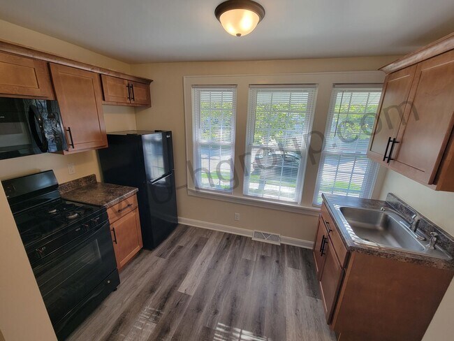 Building Photo - 6743 12th Ave