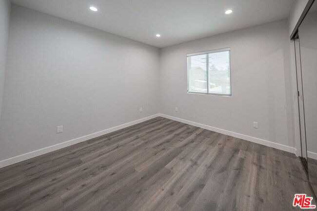 Building Photo - 5837 Cartwright Ave