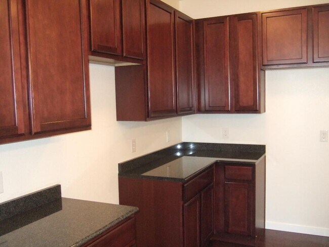 Building Photo - "Spacious 3-Bedroom Denver Condo with Cozy Fireplace & Modern Comforts!"