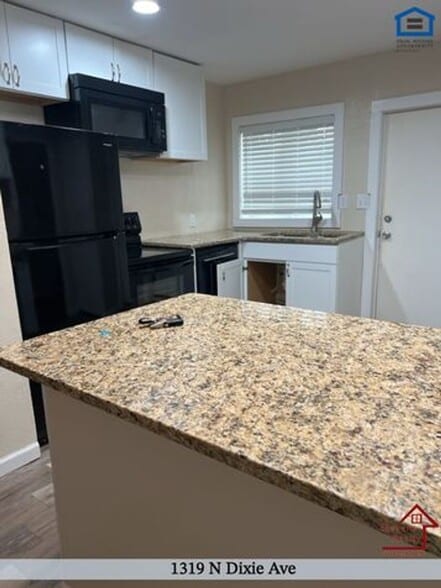 Building Photo - 1319 N Dixie Ave