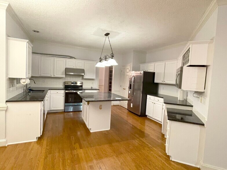 The white painting is all over the interior walls. - 4210 Shoal Creek Dr