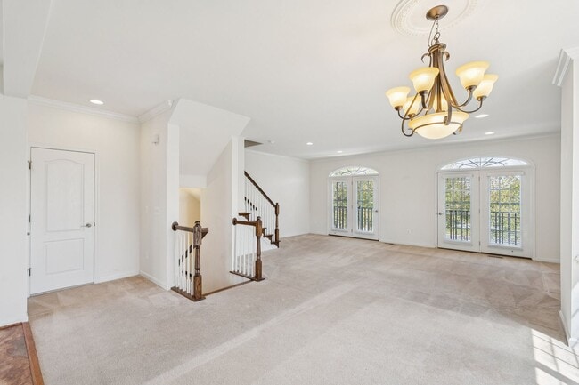 Building Photo - This beautifully maintained end-unit brick...