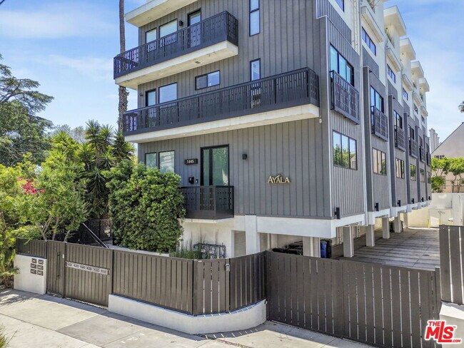 Building Photo - 1447 N Martel Ave