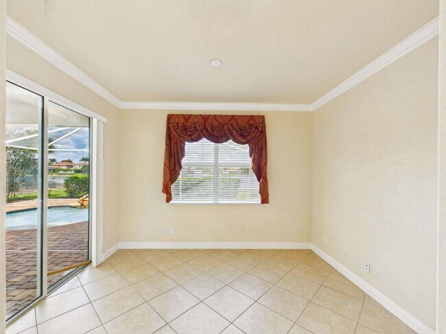 Building Photo - Luxury Lakefront Pool Home in Tesoro - Move-in Ready with Premium Inlcusions