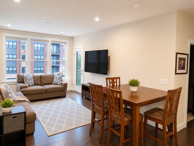 Building Photo - Sophisticated Rockville Corner Condo with Resort-Style Amenities, 2 Garage Parking Spaces