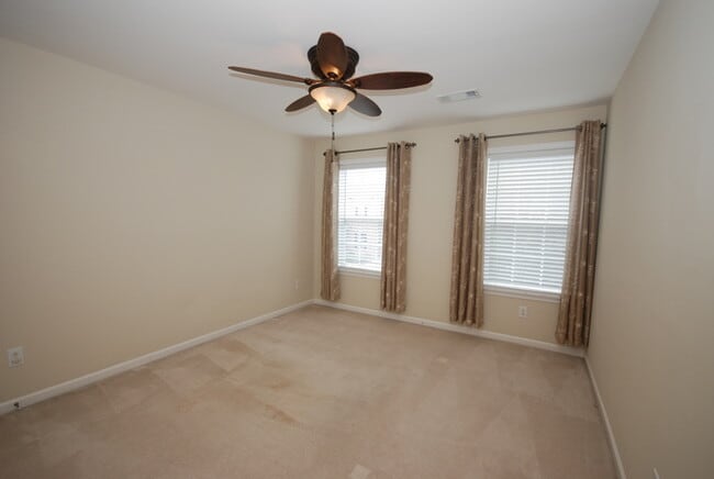 Building Photo - Oversized Executive Style Home with Finish...
