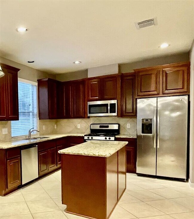 Building Photo - 5527 Custard Apple Trail