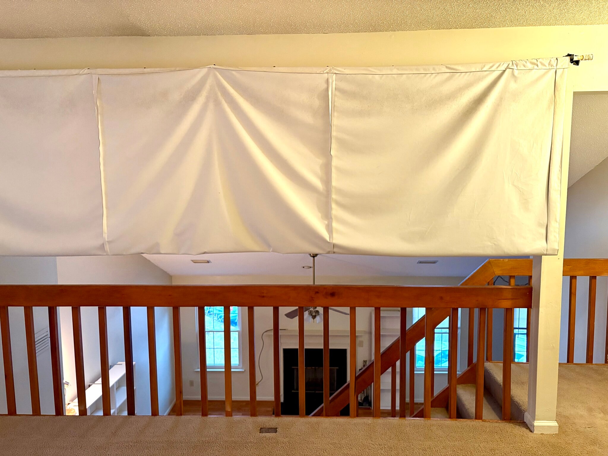 Dividing room curtain can be lowered for privacy to create a 3rd bedroom or projector screen - 208 Quarter Trl