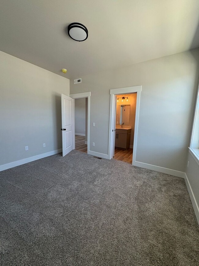 Building Photo - New construction townhome – two bed two bath with garage