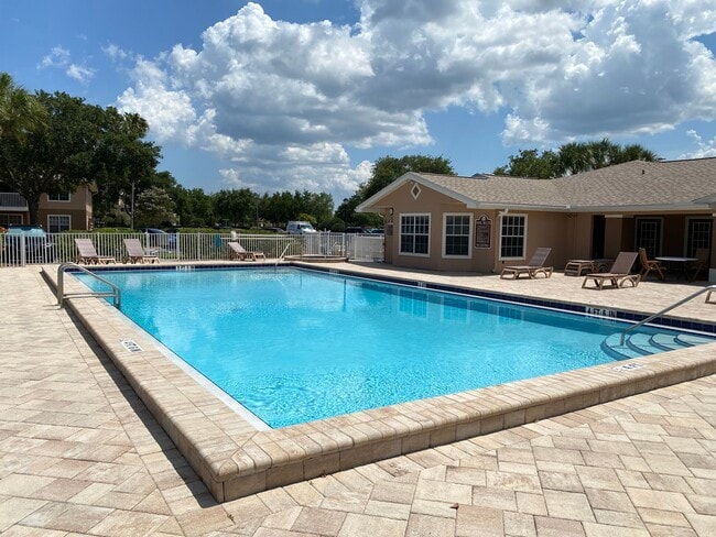 Building Photo - RESORT STYLE, GATED 1ST FLOOR CONDO LOCATE...