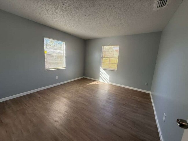 Building Photo - Cute, Coxy & Upgraded 2/1 Duplex!! Apply for FREE This Holiday Season!