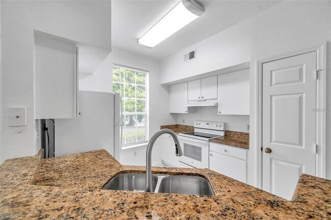 Building Photo - 9602 Lake Chase Island Way