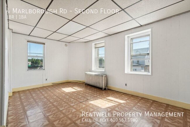 Building Photo - 1BR 1BA Second Floor Apartment is Upper Da...