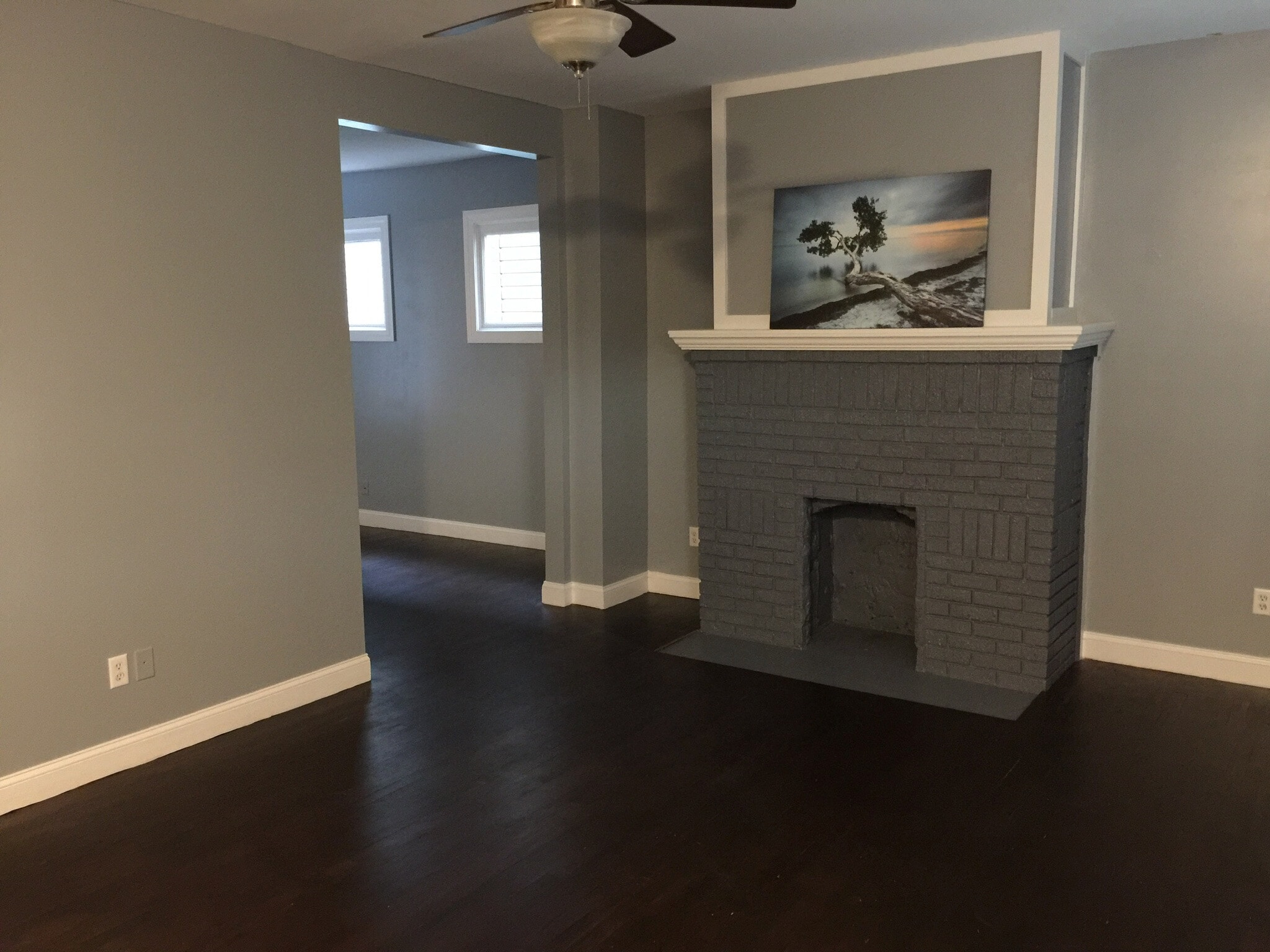 refinished hardwood floors in large living room - 804 Carpenter St