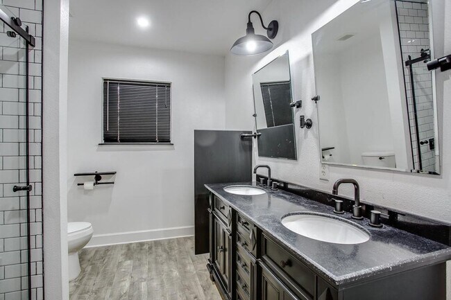 Building Photo - Spacious 4-Bedroom Home with Dual Living Areas