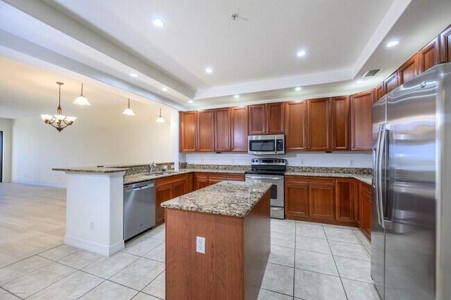 Building Photo - PRICE DROP!! Luxury Waterfront Living with Deeded Dock – Punta Gorda Isles