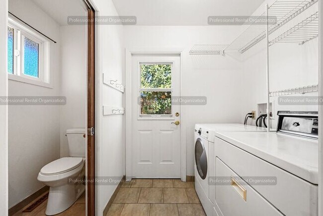 Building Photo - Look No Further, this home has it all- Hot Tub, Sauna, EV Charger, Solar, KOI Pond & More