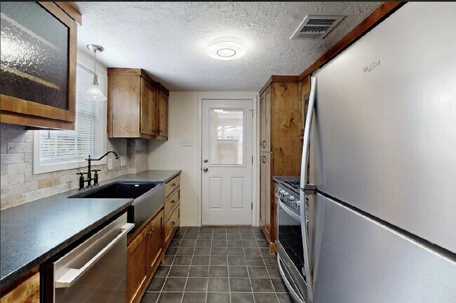 Building Photo - Title Completely Updated Historic Bryan Charmer with Modern Finishes & Timeless 1935 Character