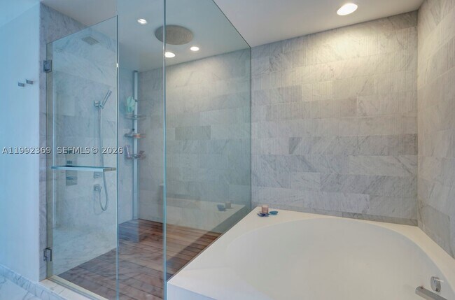 Building Photo - 10203 Collins Ave